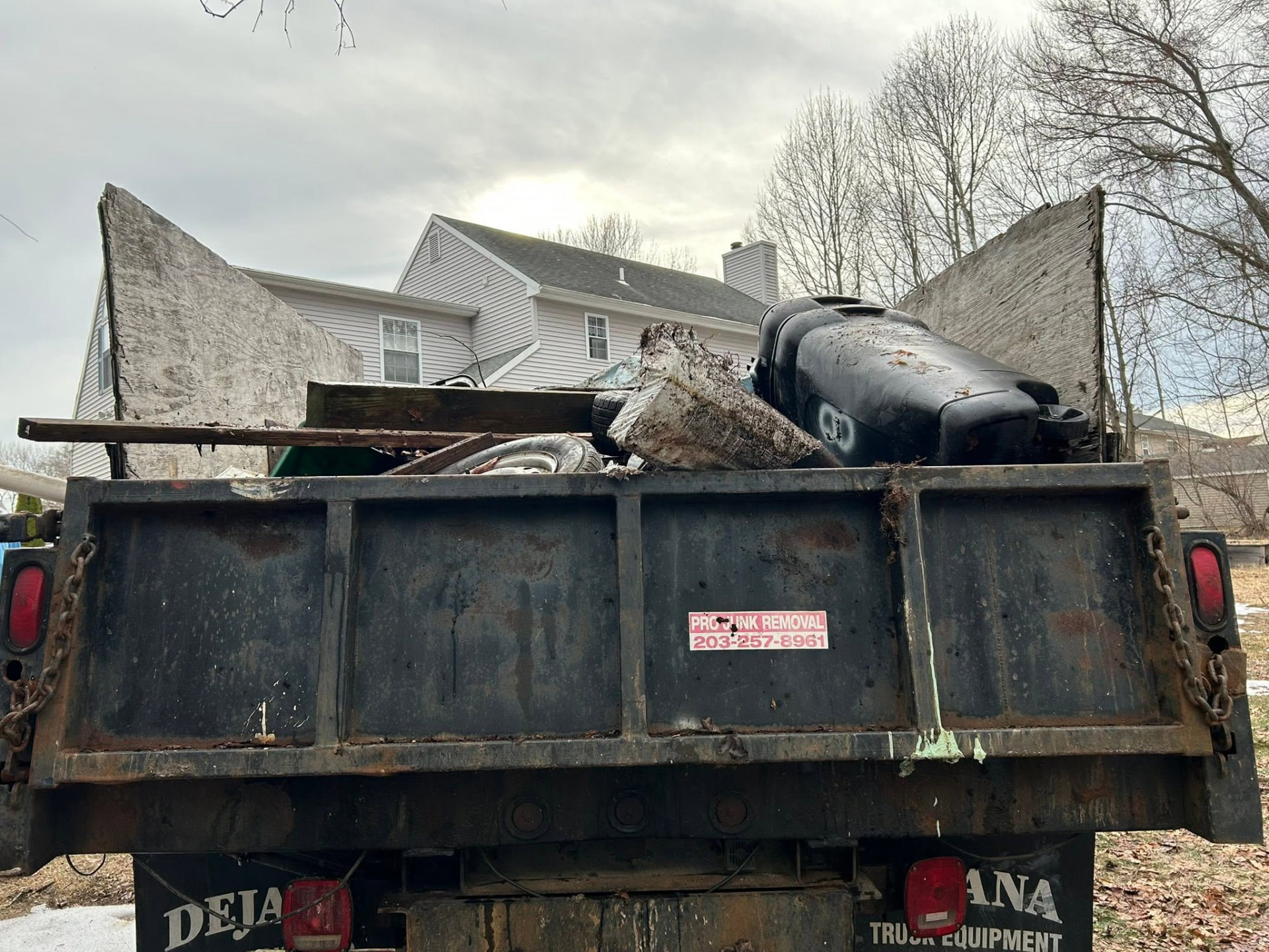 Truck loaded with removed items